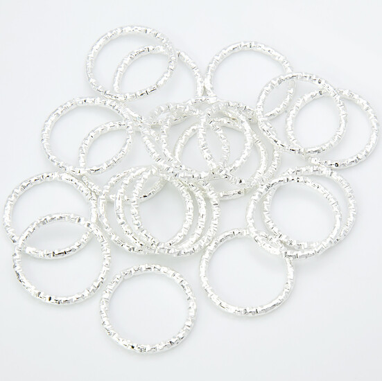 Соединительное кольцо рельефное одинарное 18х1,8 мм Серебро +-20 шт.