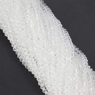 Бусины хрустальные Биконус 3,5х3,2 мм Ø 0,8 мм (+-125 шт.) Прозрачный