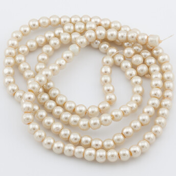 Бусины стекло под жемчуг Шар 6 мм ±140 шт. 80 см Кремовый