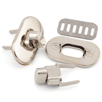 Замок для сумки поворотный 35х19х15 мм 1 шт. Платина