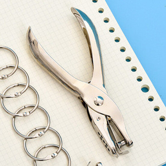 Дырокол для бумаги металлический 6 мм 13х5,7 см 1 шт.