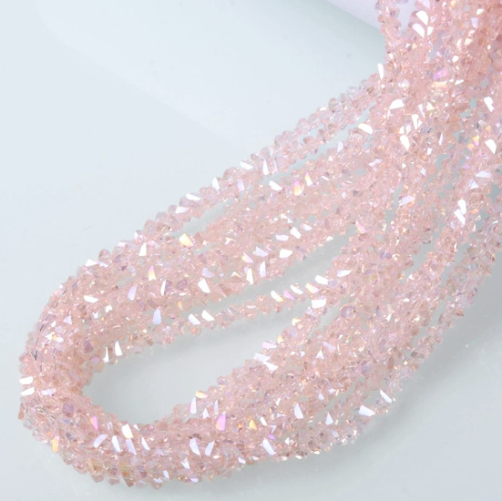 Бусины Swarovski огранка треугольник 6 мм Ø 1 мм 30 см (+-85 шт.) Пудровый АВ прозрачный