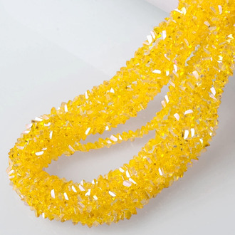 Бусины Swarovski огранка треугольник 3 мм Ø 0,8 мм 27 см (+-130 шт.) Желтый АВ прозрачный