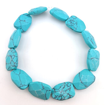 Бирюза (имит) бусины плоские из камня огранка 12х17х6 мм ±20 см 12 шт.