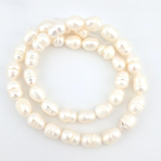 Жемчужины Ovalé Ivory Pearls 6-7 мм ± 34 см 26 шт. Кремовый